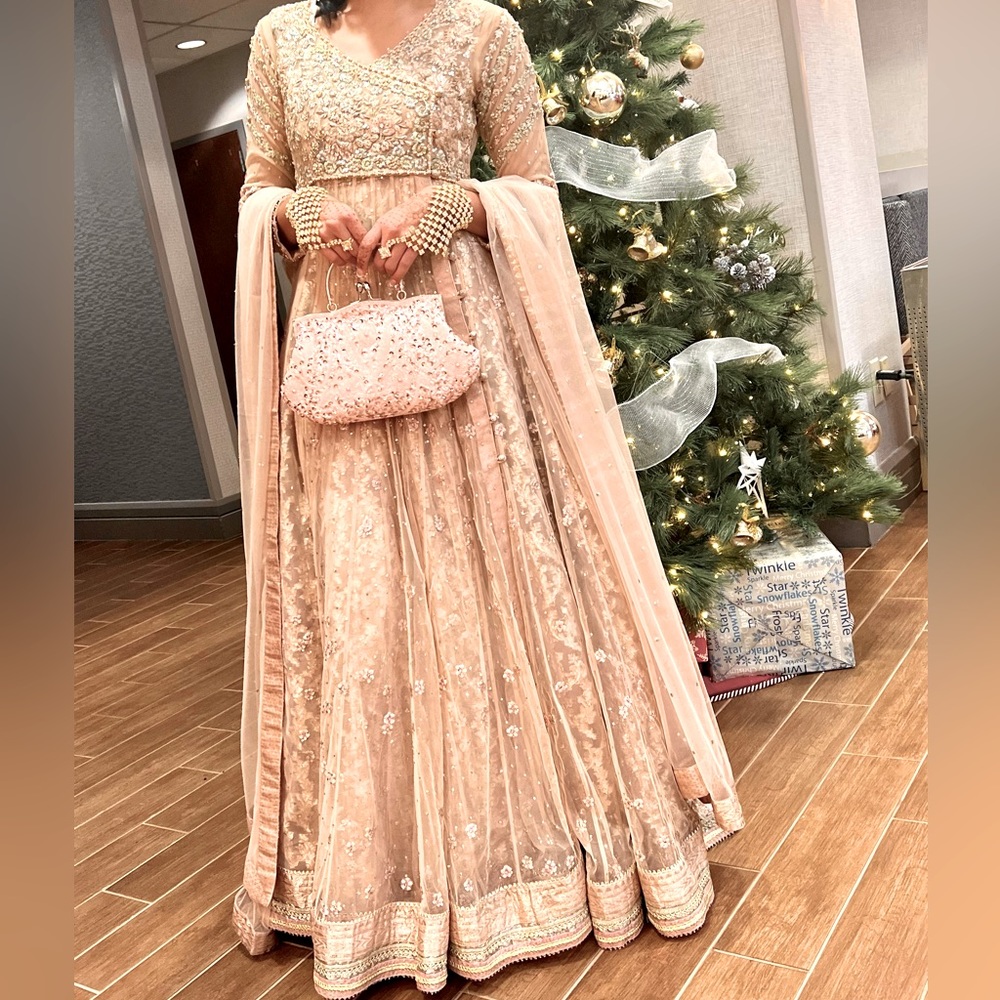 Designer formal Pakistani lehnga gown Umsha by Uzma Babar